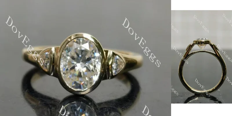 Women’s engagement rings with sapphires-Doveggs oval bezel three stones moissanite engagement ring